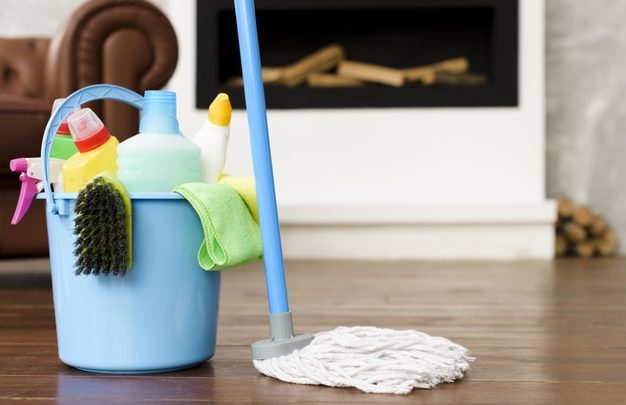 Cleaning Supplies That Are In A bucket paired wirth a mop